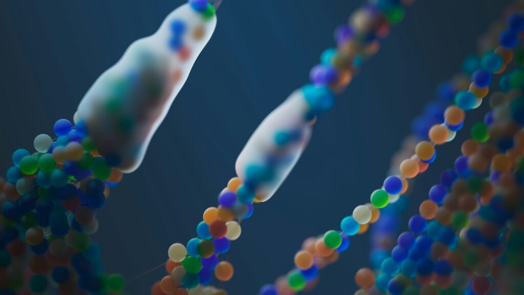 Artist's illustration of protein folding resembling a close-up of a bunch of beads
