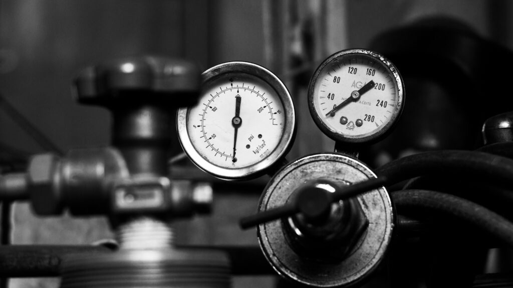 HPLC vs UPLC: What Changes When a Peptide Is Analyzed at Higher Pressure 1 Close-up of round pressure gauges and their valves