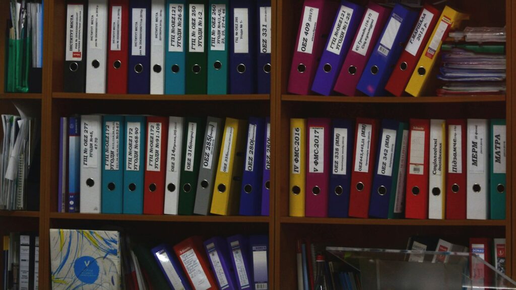 Lot Number and Batch Traceability: What the Number on a Vial Tells You 1 Rows of ring binders and document files arranged side by side on shelves