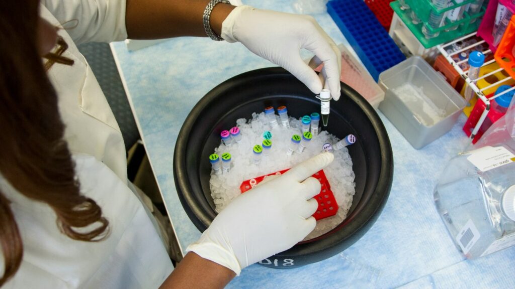 Net Peptide Content and TFA vs Acetate Salts, Explained 1 Researcher preparing samples on ice in a laboratory